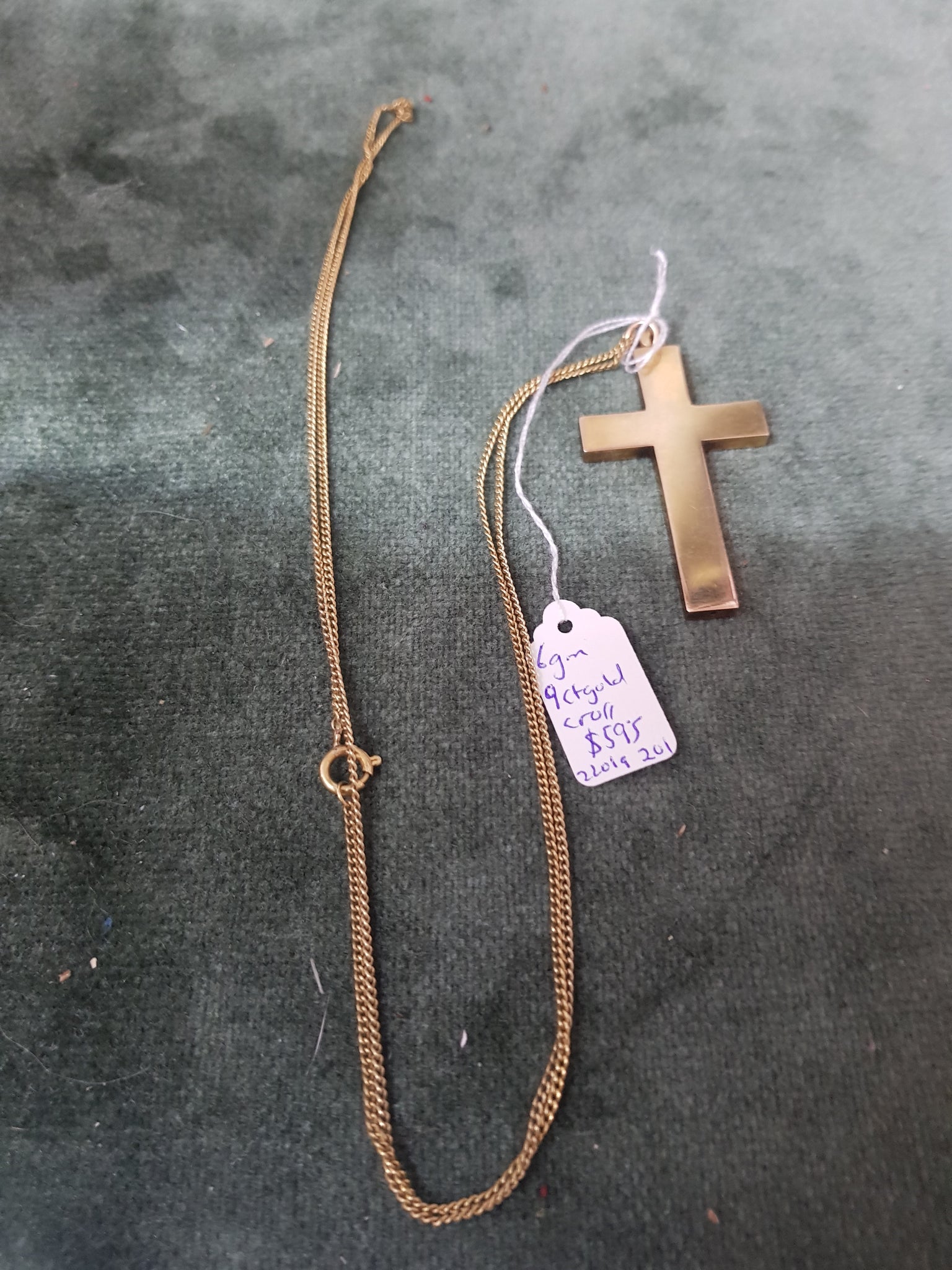 9ct Gold cross 6gms and gilt chain #201